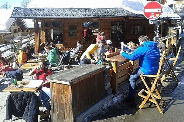 a picture of the terrace at a restaurant in verbier