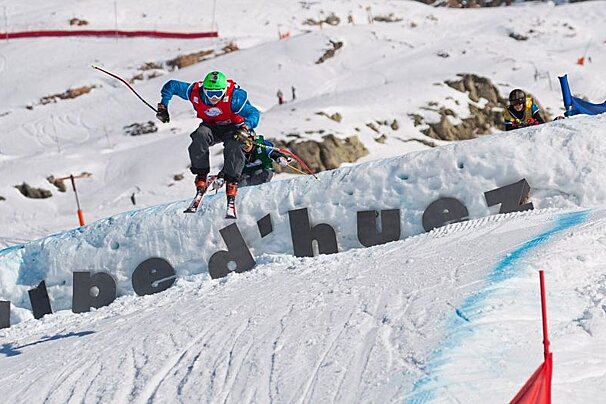 skier jumping sign of alpe d huez