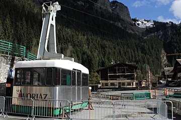 photo of cable car off wires in car park