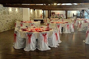 a picture of a room laid out with tables for a wedding