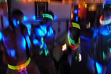 an image of a people dressed in glow sticks