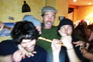 a blurry image of boys in a bar