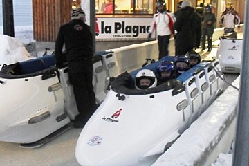 an image of people in a bobsleigh