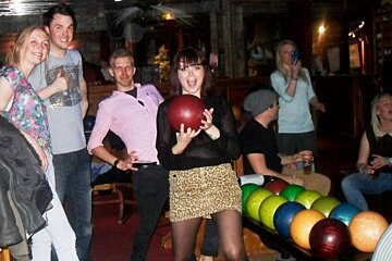 an image of people in a bowling alley