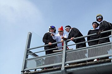 An image of men dressed as nuns in the Alps
