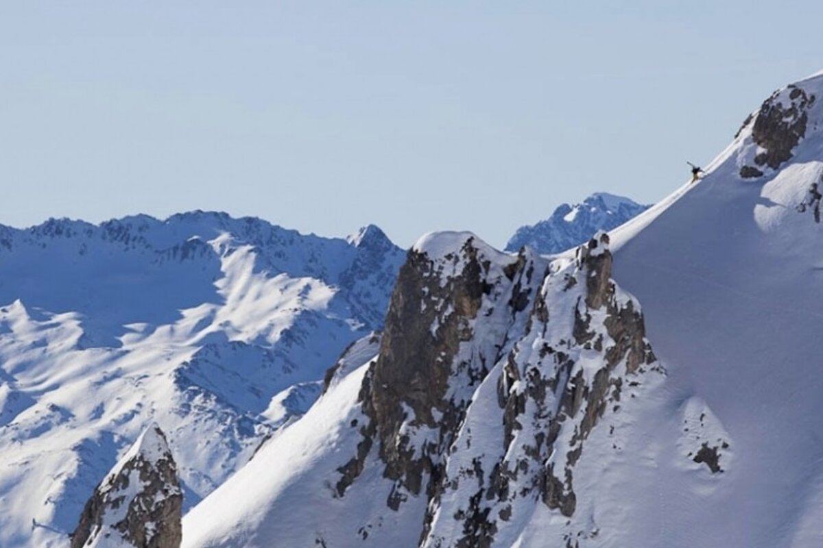 an image of candide thovex hiking up with skis in verbier