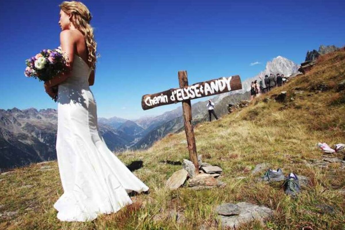 a picture of a bride on a mountainside in chamonix