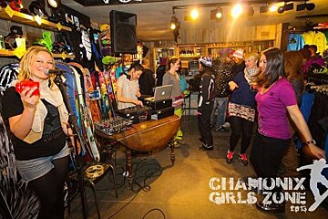 An image of people dancing in a ski and snowboard shop in Chamonix Mont Blanc