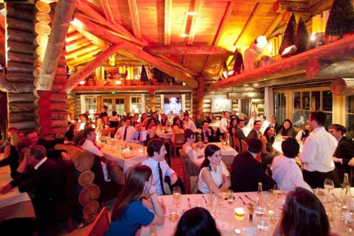 a picture of a large group of people at a wedding reception