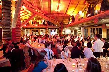 a picture of a large group of people at a wedding reception