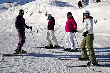 an image of pistes with skiers on them