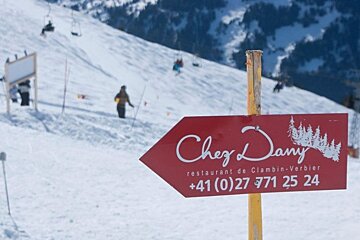 an image of chez dany restaurant sign verbier