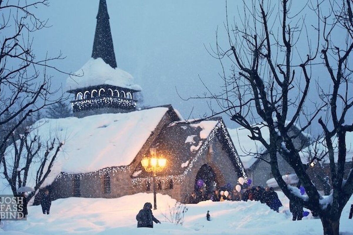A picture of a snowy church taken by josh fars bind