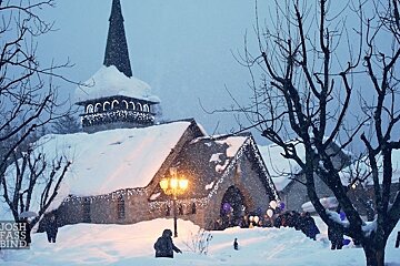 A picture of a snowy church taken by josh fars bind
