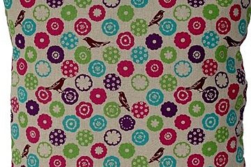 a picture of a cushion with a pattern with birds on
