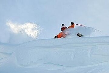 an image of a skier jumping