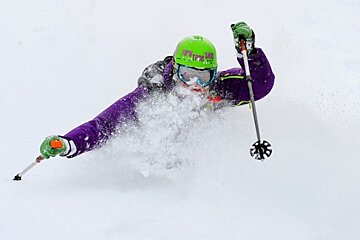 an image of a skier in very deep powder snow