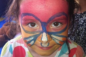 an image of a child with facepaint