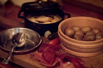 an image of cured meat and potatoes