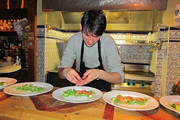 an image of man preparing food