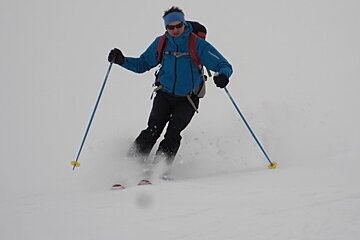 skier in fresh snow off piste