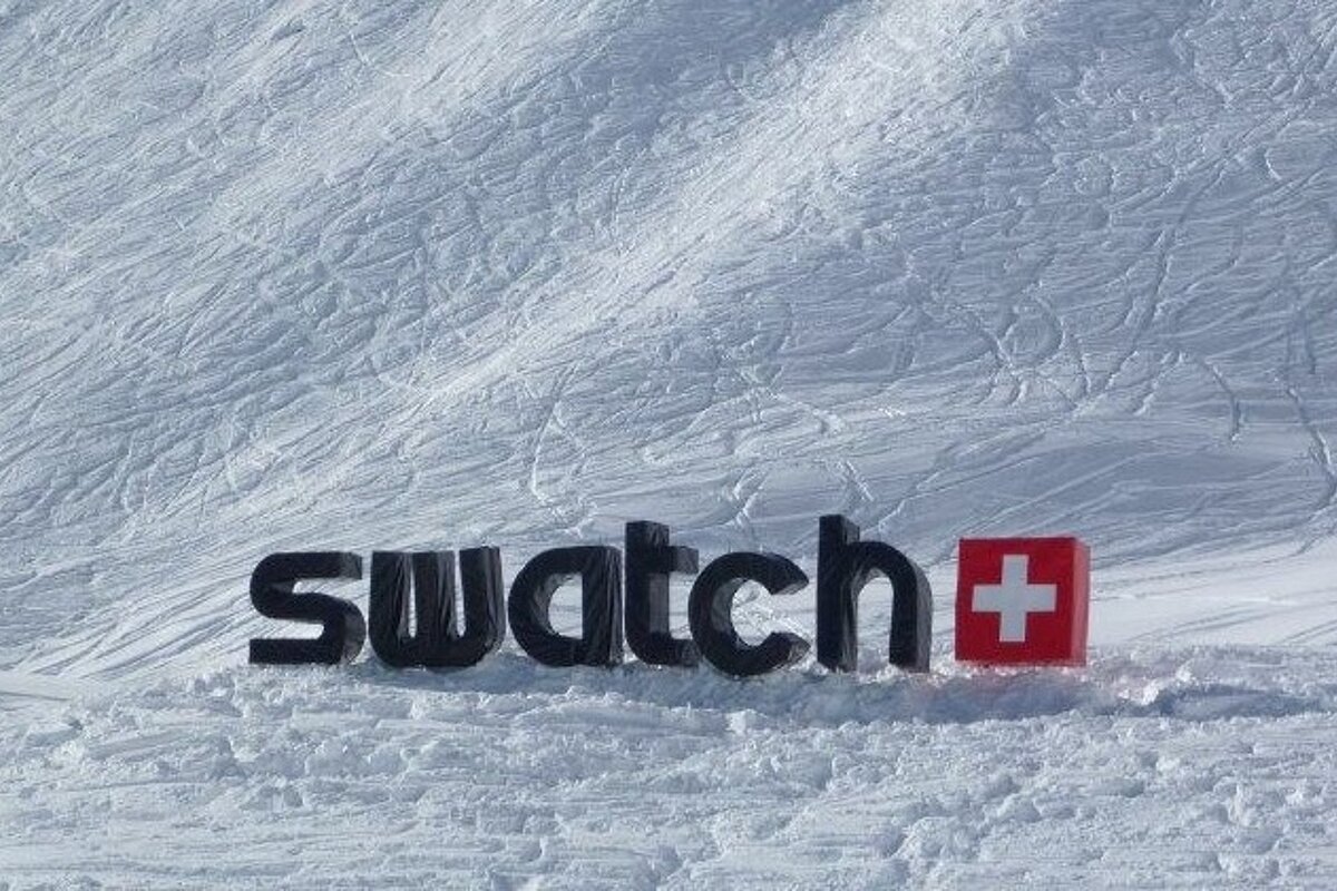 The word swatch is on a snowy surface