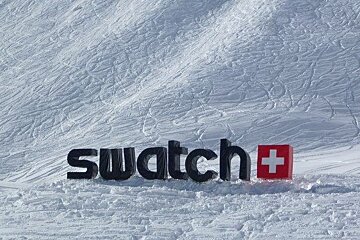 The word swatch is on a snowy surface