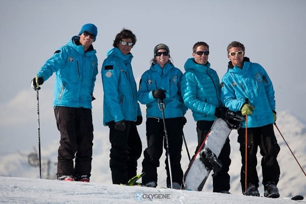 ski instructors lined up blue jackets oxygene la plagne