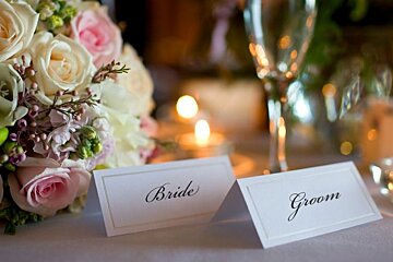 a picture of a bridal posey and bride and groom name tags