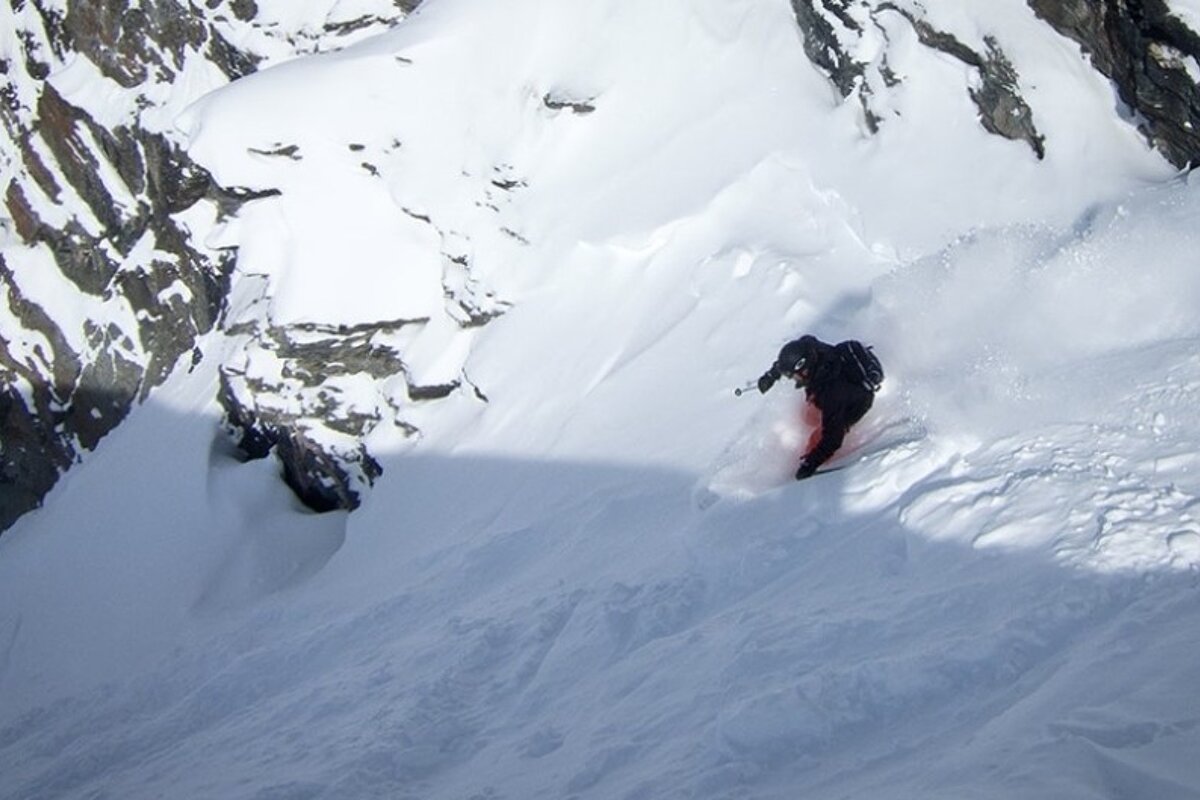 an image of skier heading into a couloir