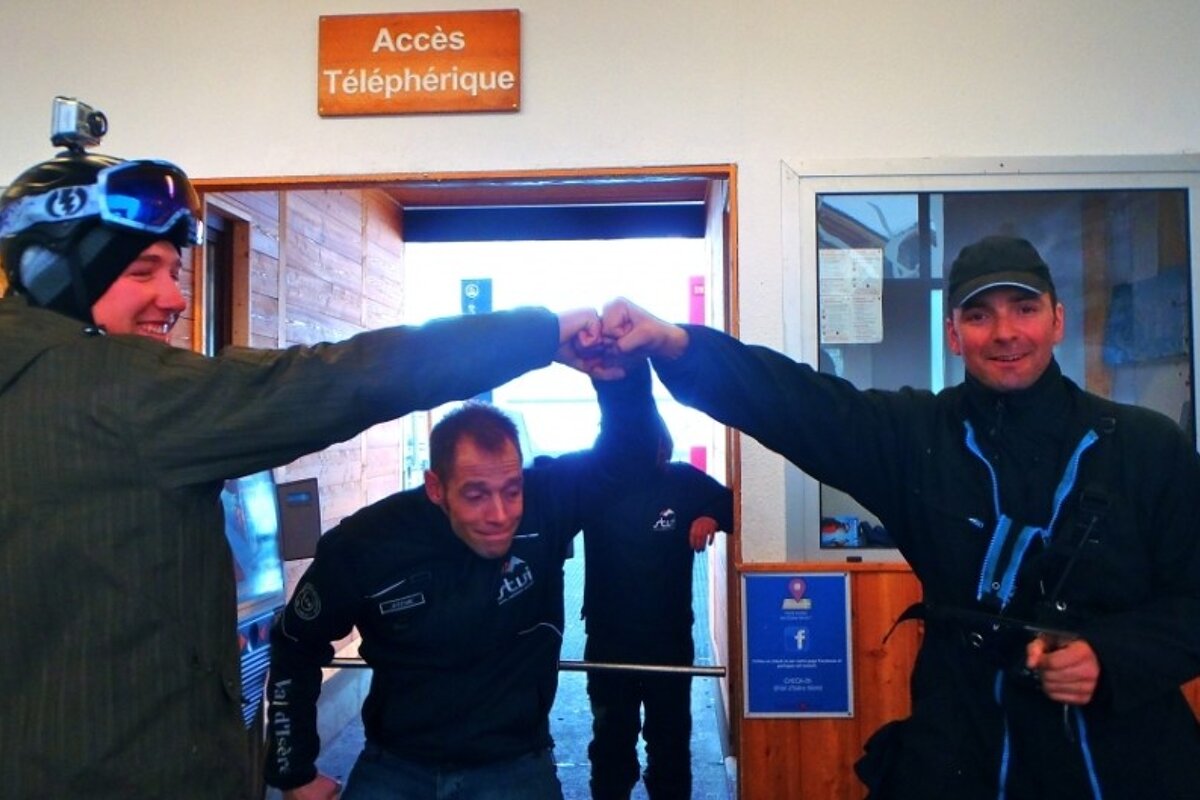 an image of two girls in ski one piece suits