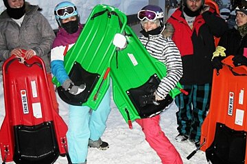 an image of people about to go sledging