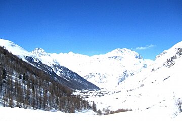 an image of overexposed sunny mountains