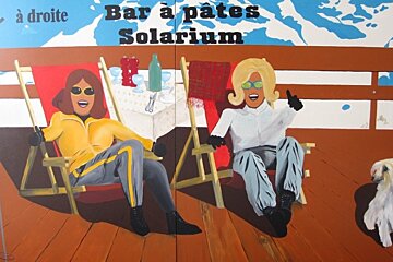 mural of sunbathers