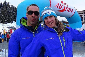 a ski cross racer in a blue jacket