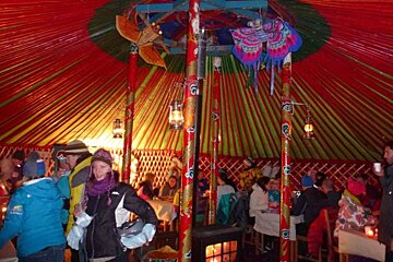 a picture of the inside of a yourt at night