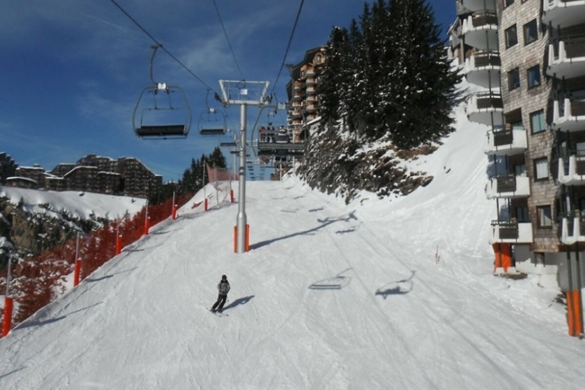 an images of chairlift going through Avoriaz