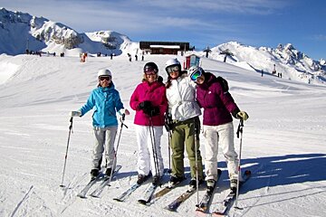 an image of girls lined up in ski gear