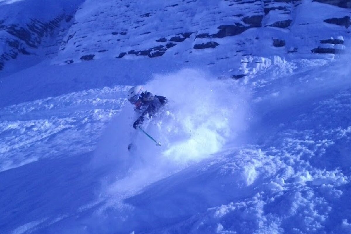 an image of skiing in deep powder snow