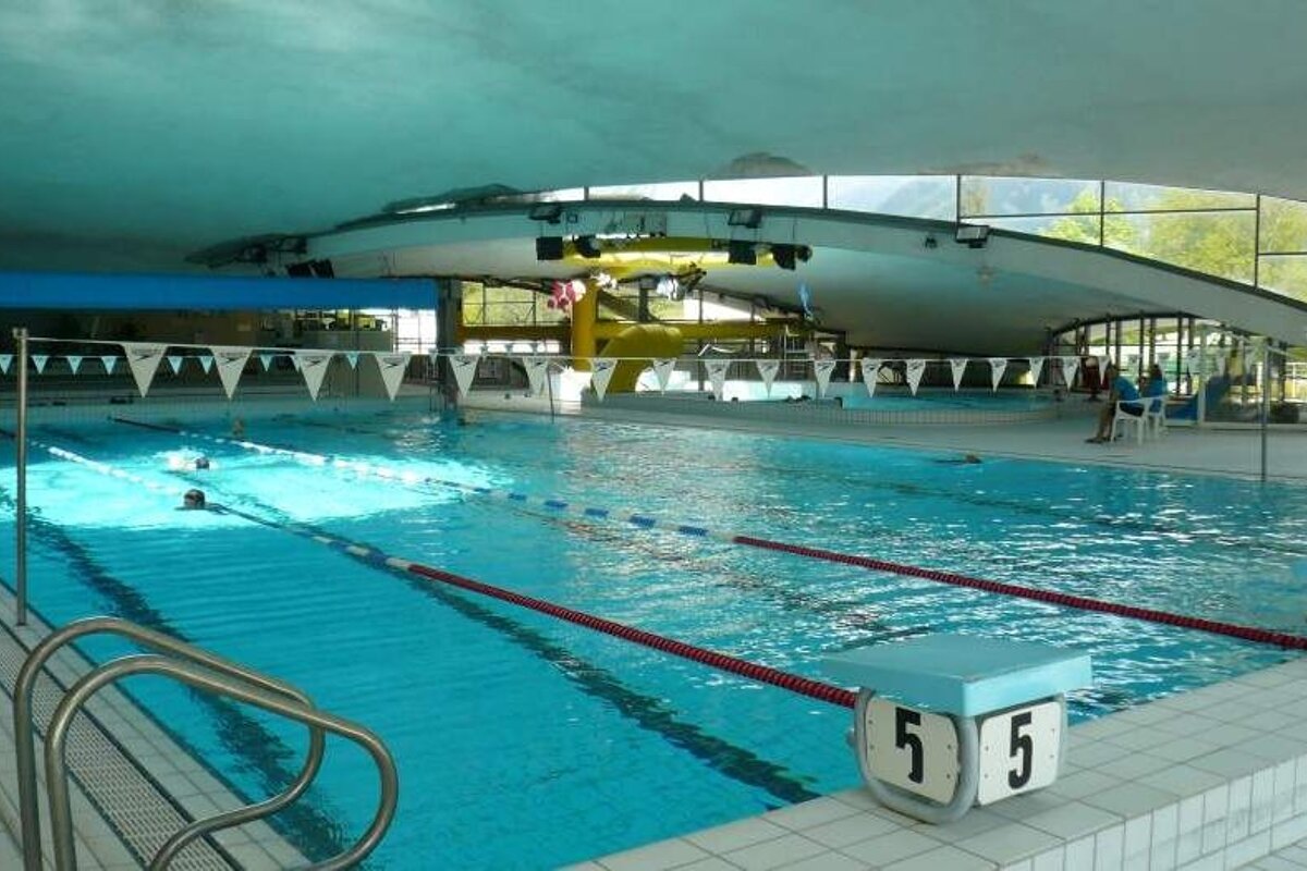 A swimming pool with the number 55 on the bottom