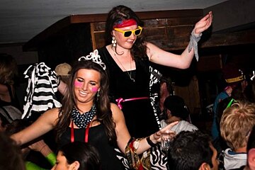 an image of people Dancing on tables at The Lounge verbier