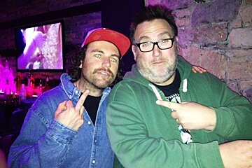 an image of two men in a bar