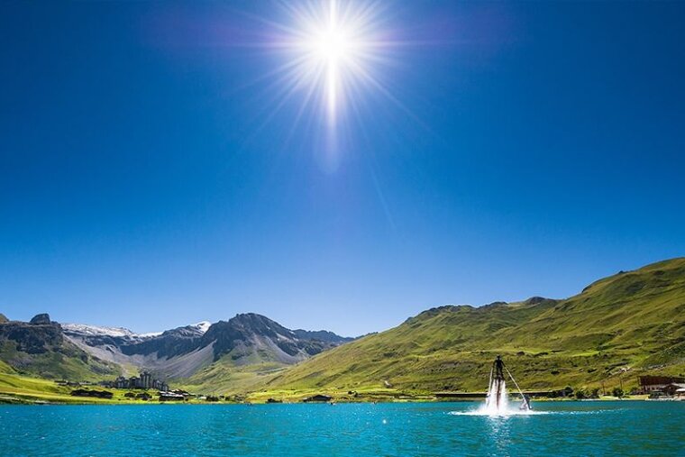 A view over Tignes Lake on a sunny day