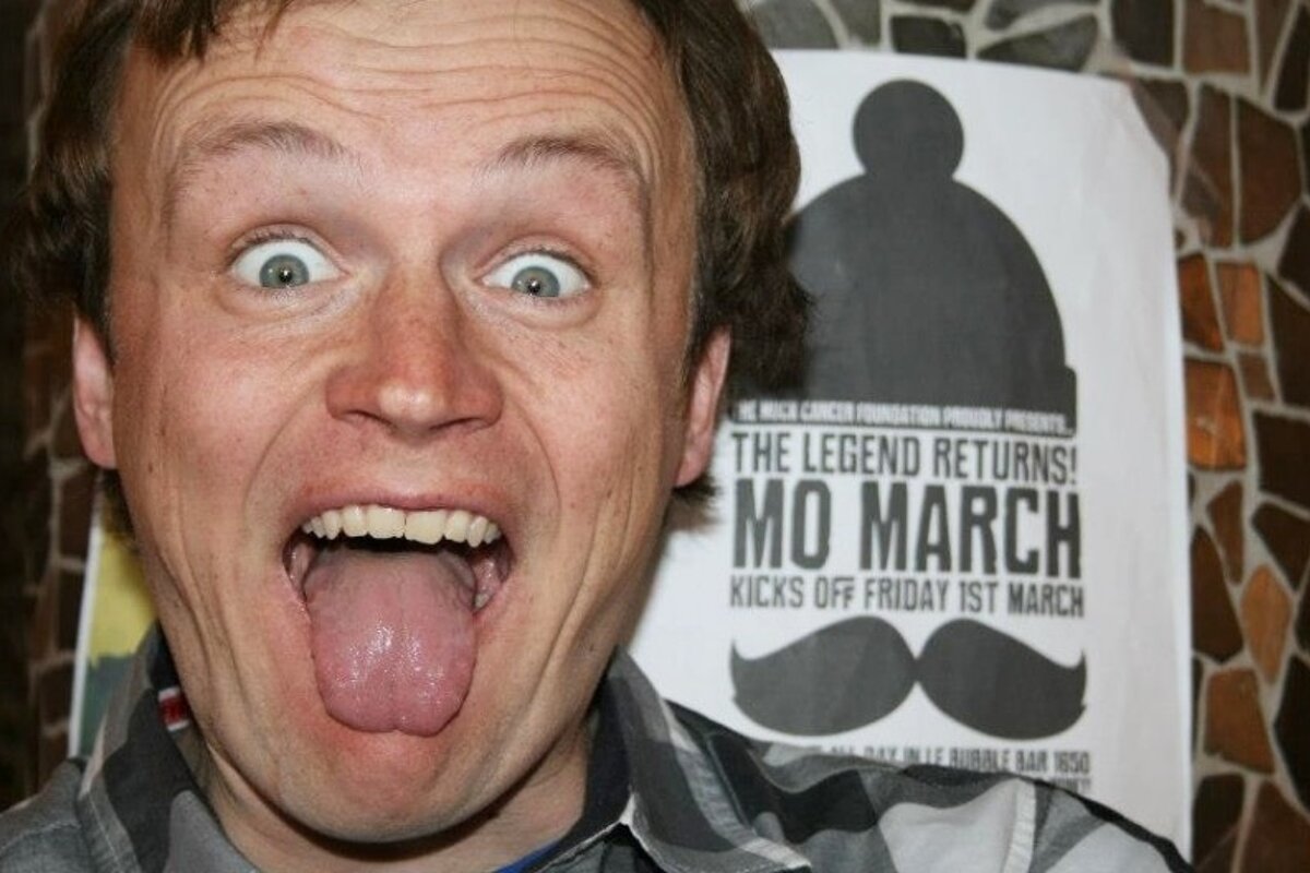an image of a man with his tongue out