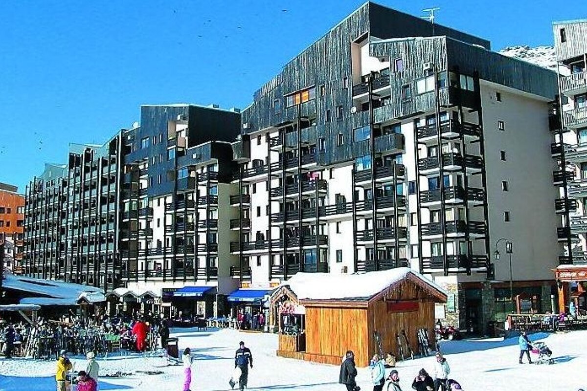 image of large apartment blocks on the side of the pistes