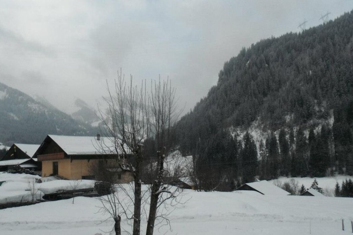 an image of a valley in snow