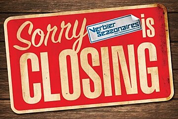A red sign that says sorry closing on it