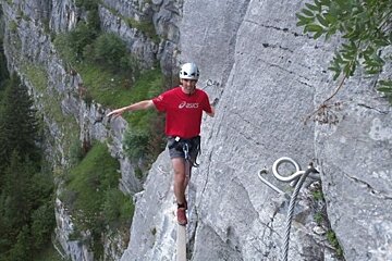 climbers on via ferrata alps
