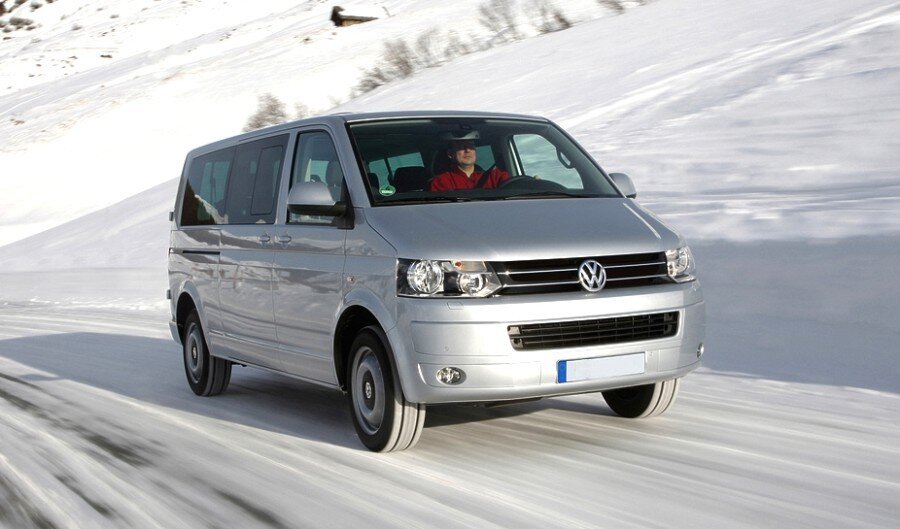 an image of a vw caravelle minibus travelling on snow
