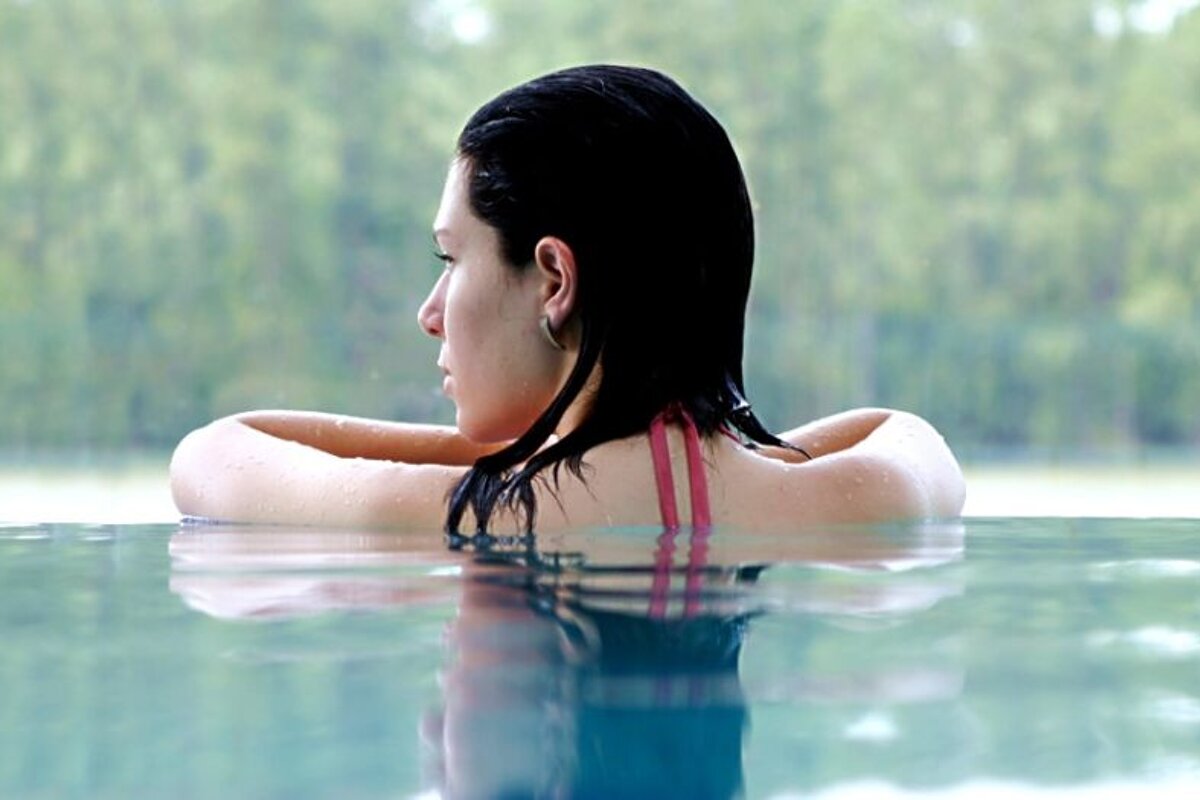 woman relaxing in spa pool